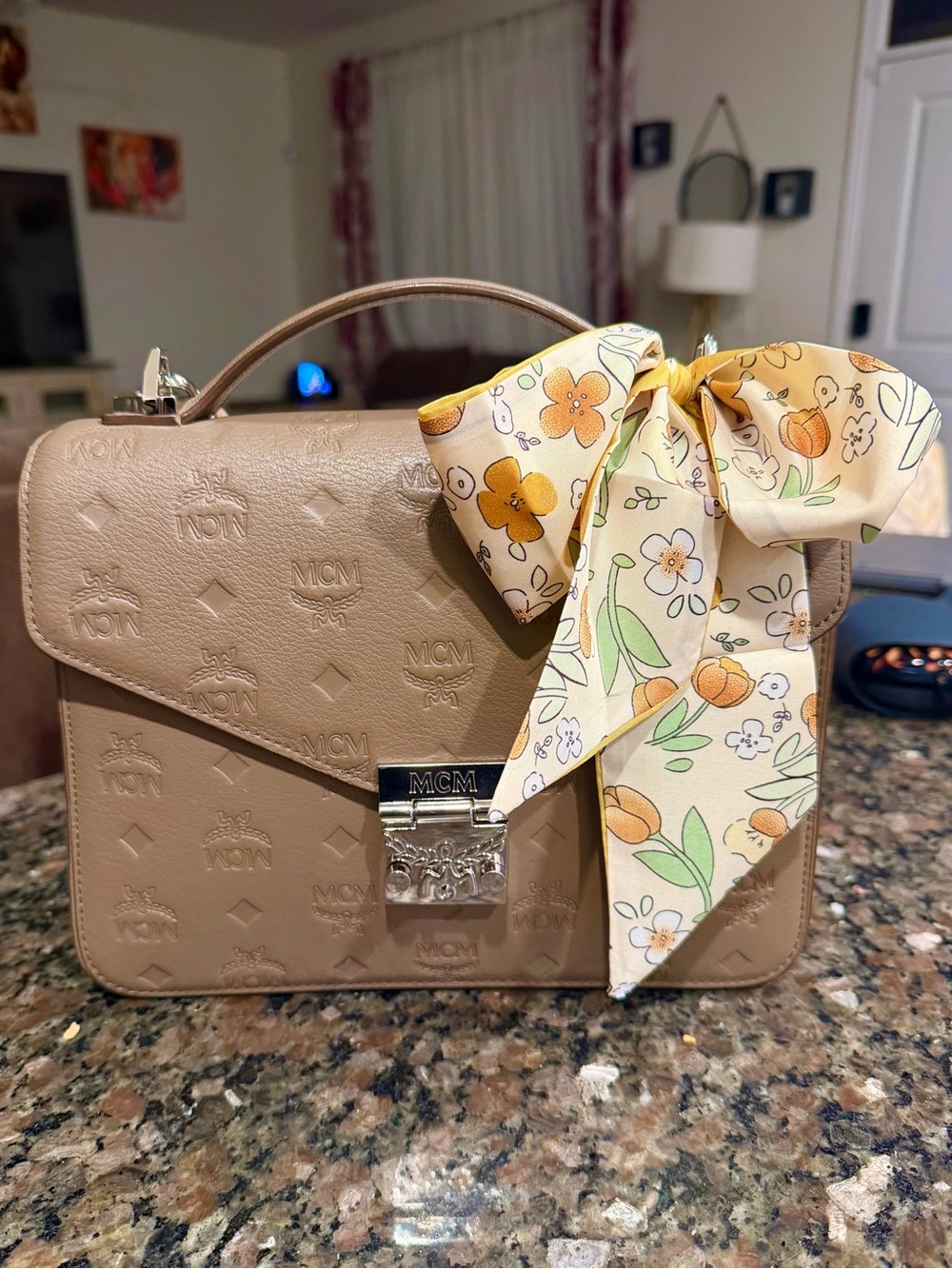 PRE LOVED MCM Patricia
Metis Monogrammed Crossbody in Beige